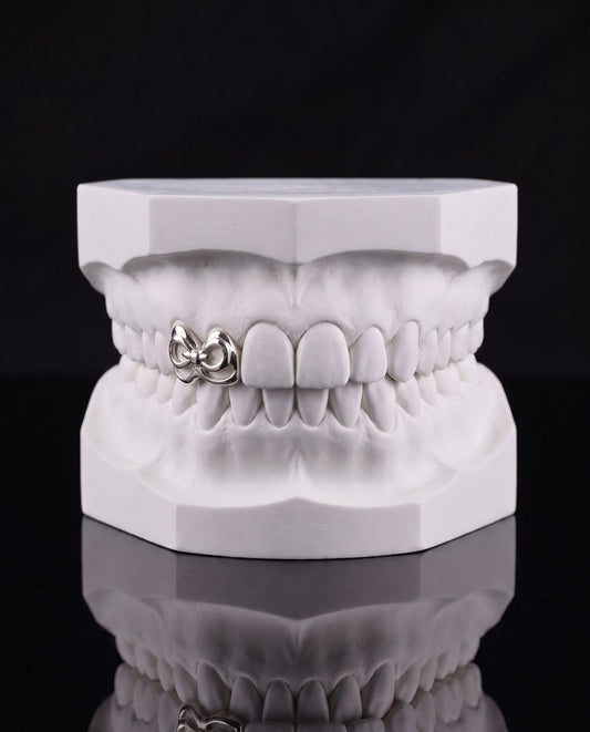 Bow custom grillz by AVM Gems