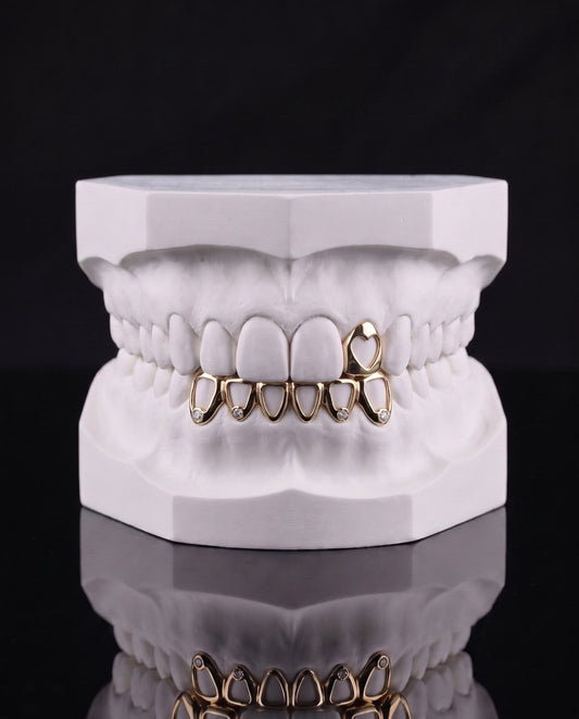 Heart and Row custom grillz by AVM Gems