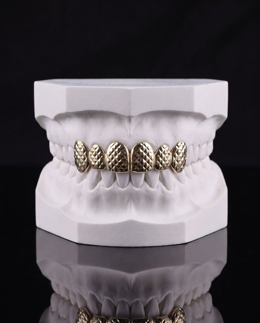 Six Cut custom grillz by AVM Gems